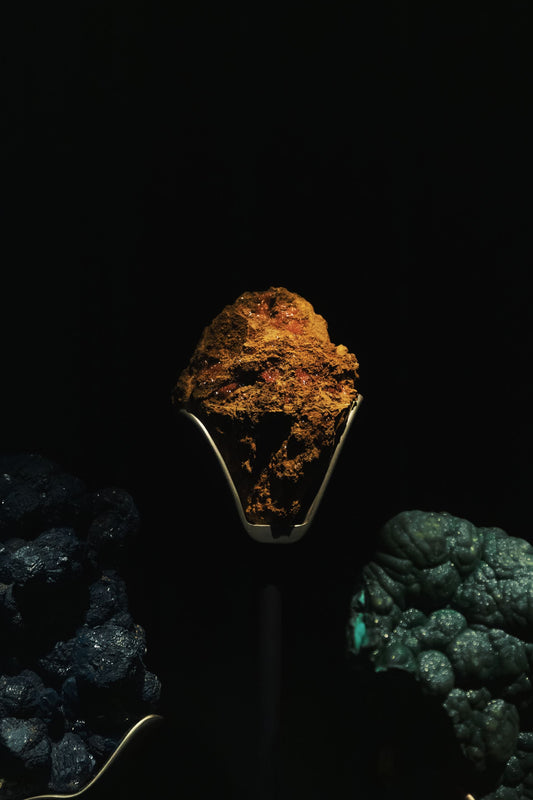 Raw minerals in dramatic light — the mineral wealth inside shilajit